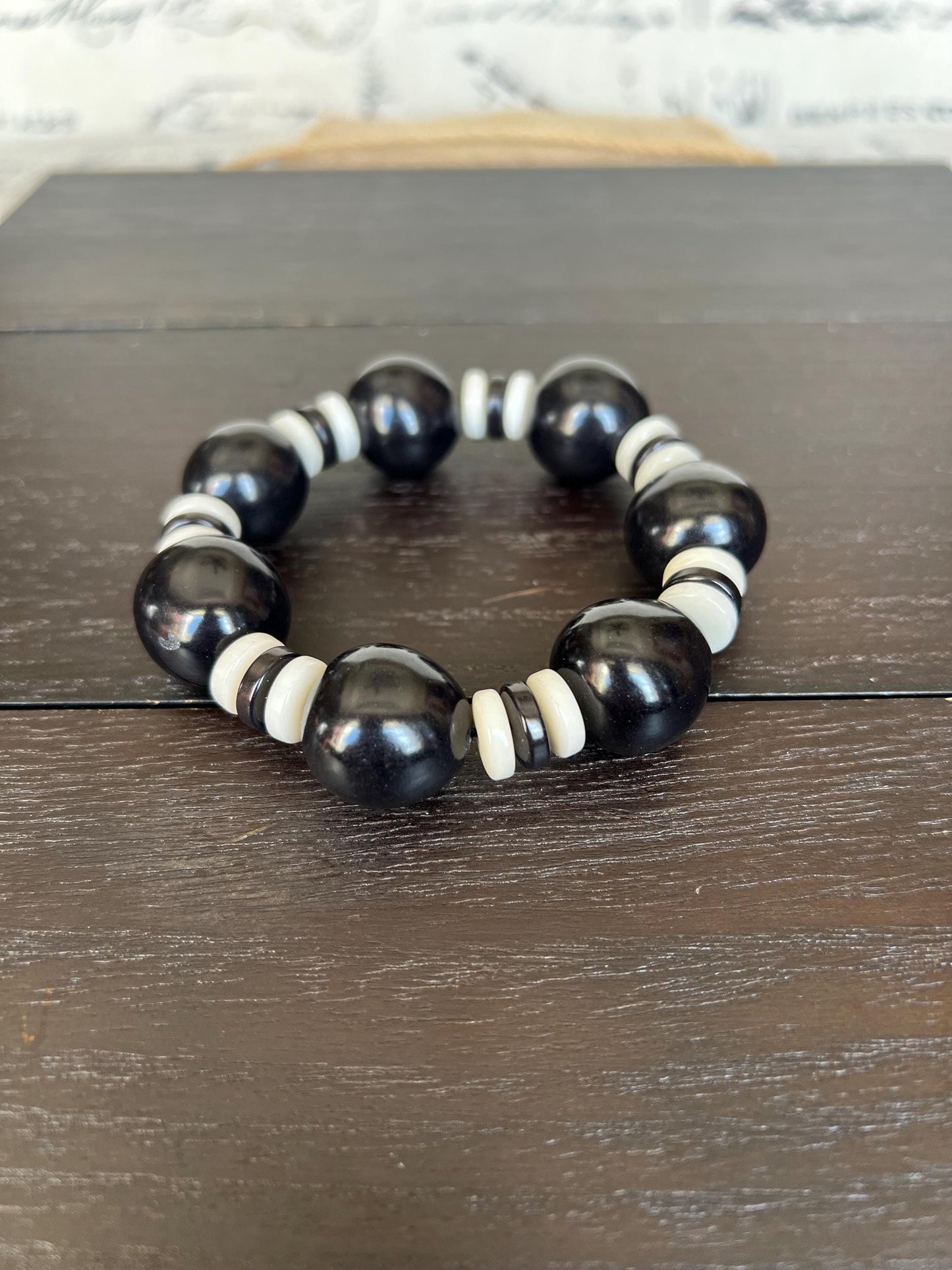 Black and white statement bracelet Tagua jewelry Big bold bangle Wearable art Fall fashion 2025s Trendy custom jewelry Stretch elastic