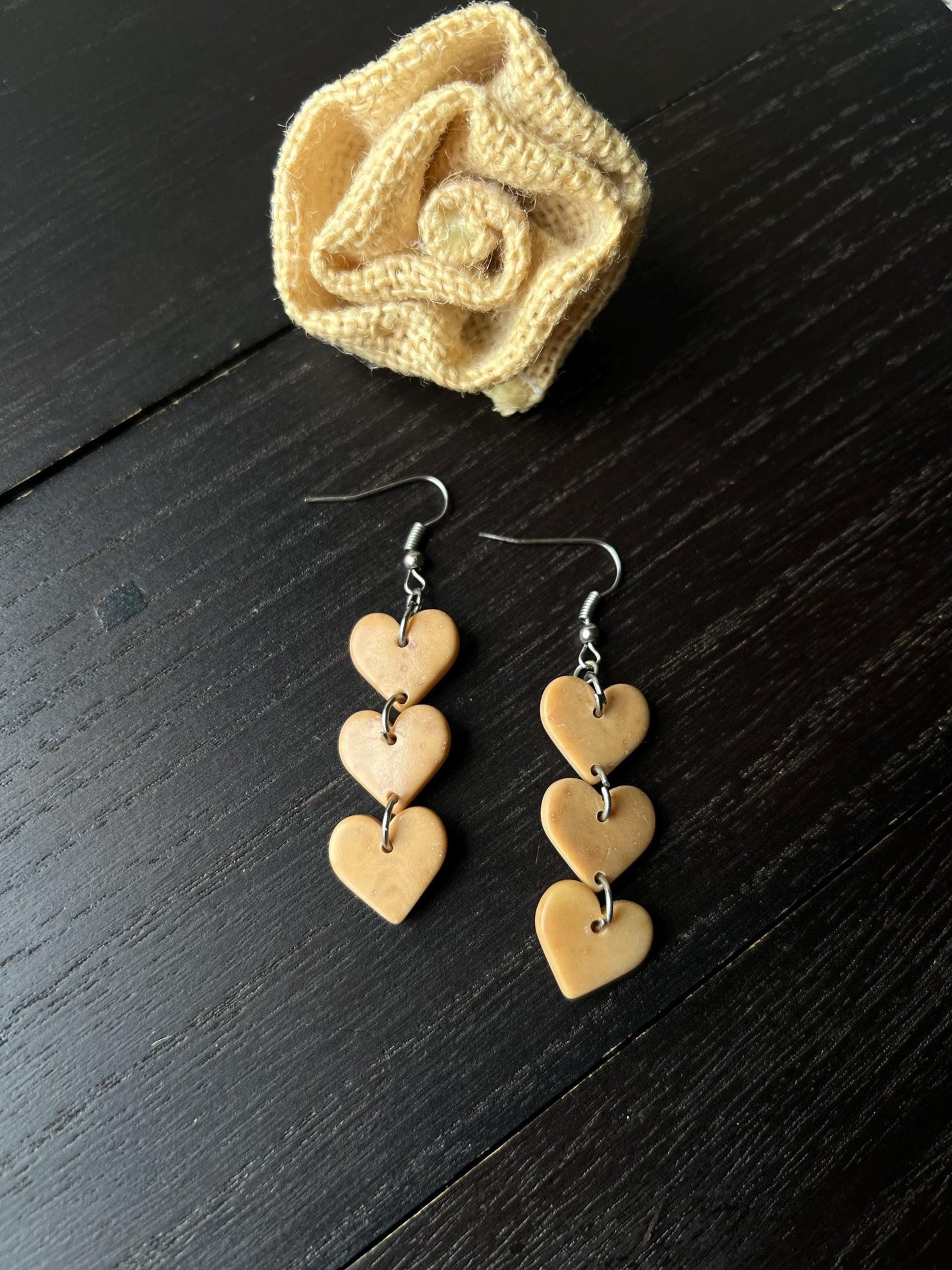 Beige earrings.
Heart earrings
Statement drop earrings
Gifts for mom