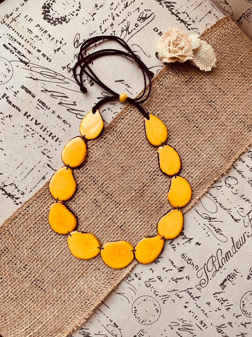 Yellow beaded necklace Tagua nut jewelry Long bib collar with adjustable leather straps Presents from Ecuador for Fall fashion trends