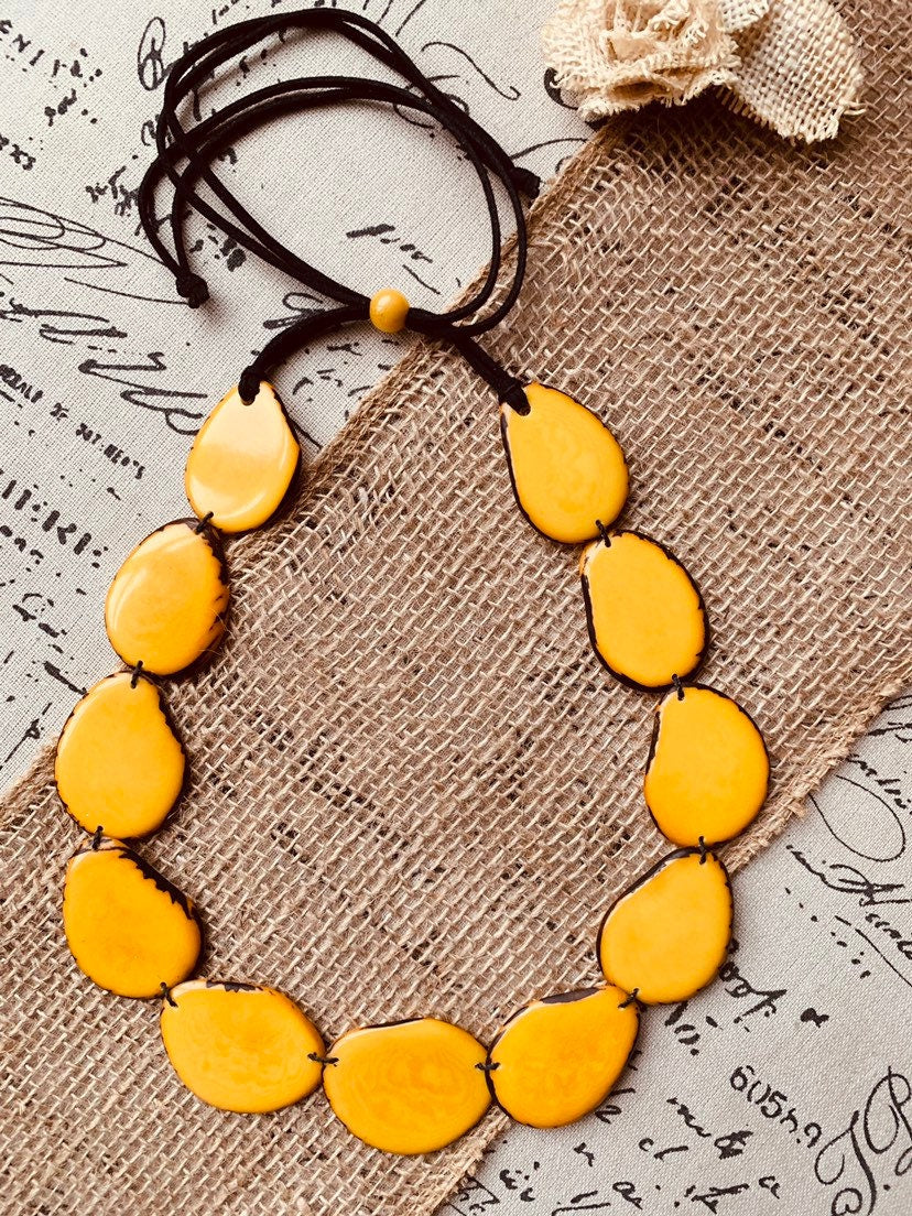Yellow beaded necklace Tagua nut jewelry Long bib collar with adjustable leather straps Presents from Ecuador for Fall fashion trends