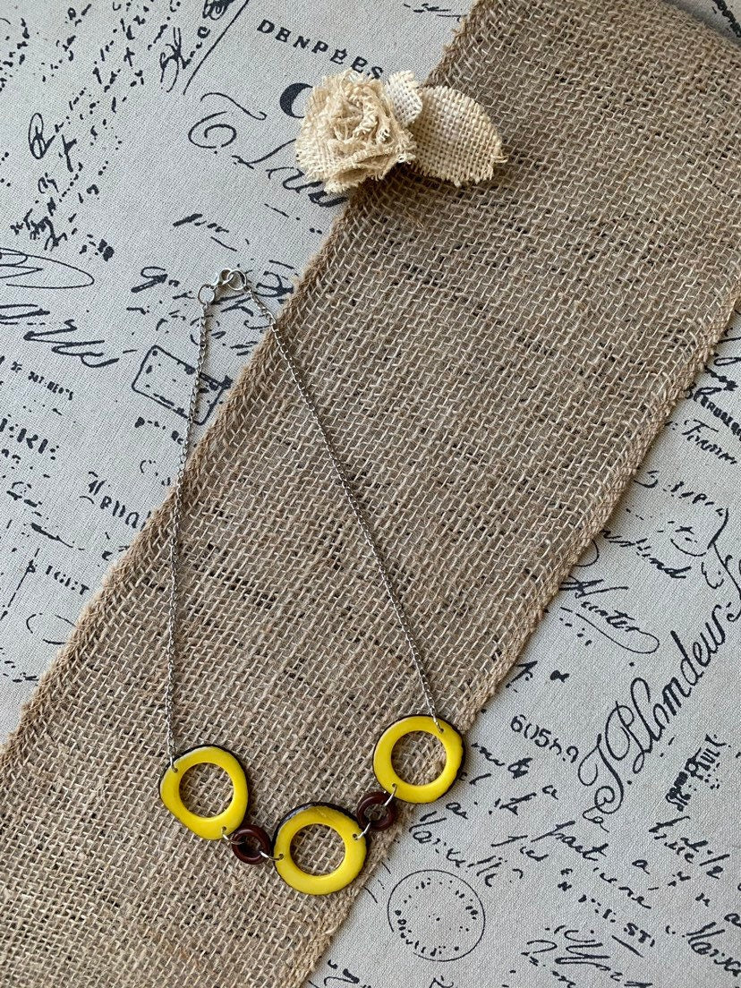 Yellow Tagua nut necklace with silver chain Resort wear Lightweight jewelry Statement handmade beads Spring fashion trends Beach style