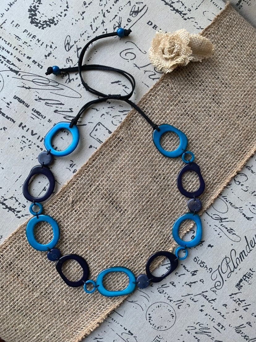 Turquoise blue necklace Statement geometric jewelry Handmade donut shape bead Spring fashion trends Anniversary gifts for wife Beach wedding