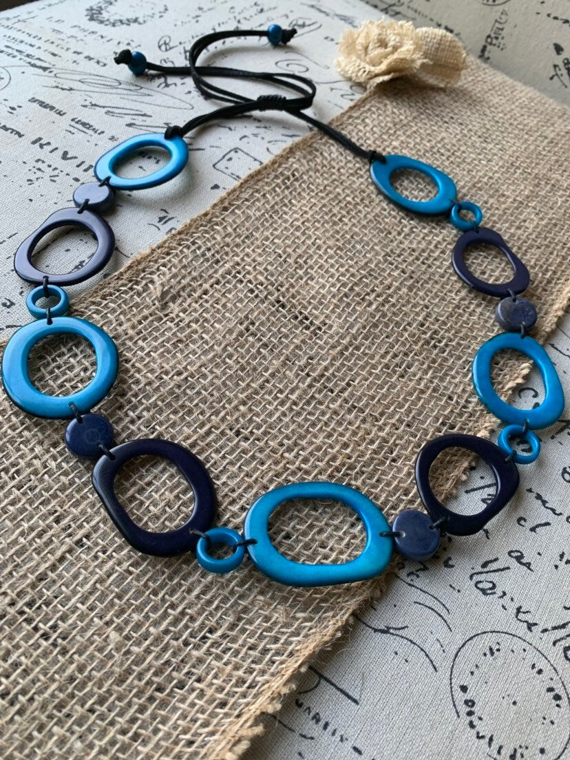 Turquoise blue necklace Statement geometric jewelry Handmade donut shape bead Spring fashion trends Anniversary gifts for wife Beach wedding