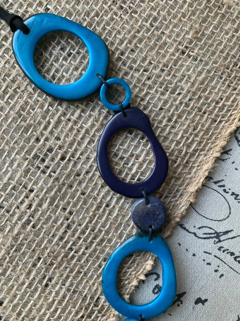 Turquoise blue necklace Statement geometric jewelry Handmade donut shape bead Spring fashion trends Anniversary gifts for wife Beach wedding