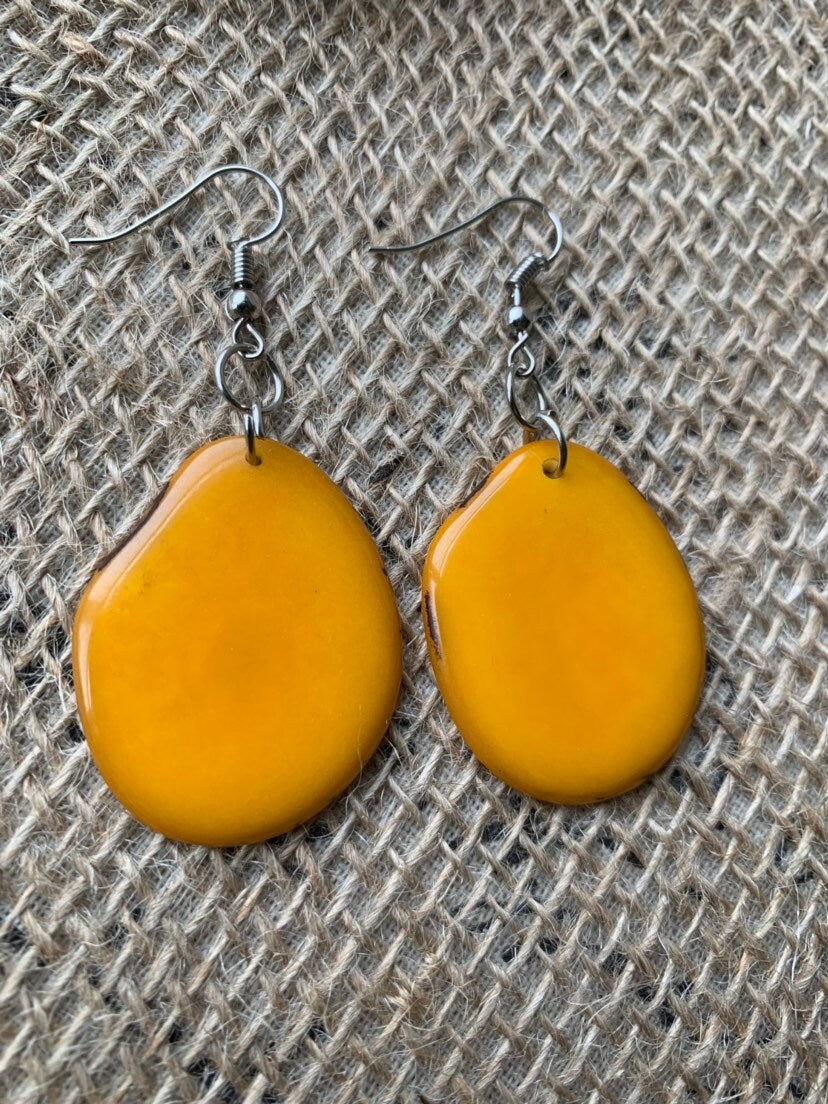 Mustard yellow earrings Tagua jewelry Statement dangle drops Summer fashion trends Artisan handmade in Ecuador Mod unusual trendy For beach