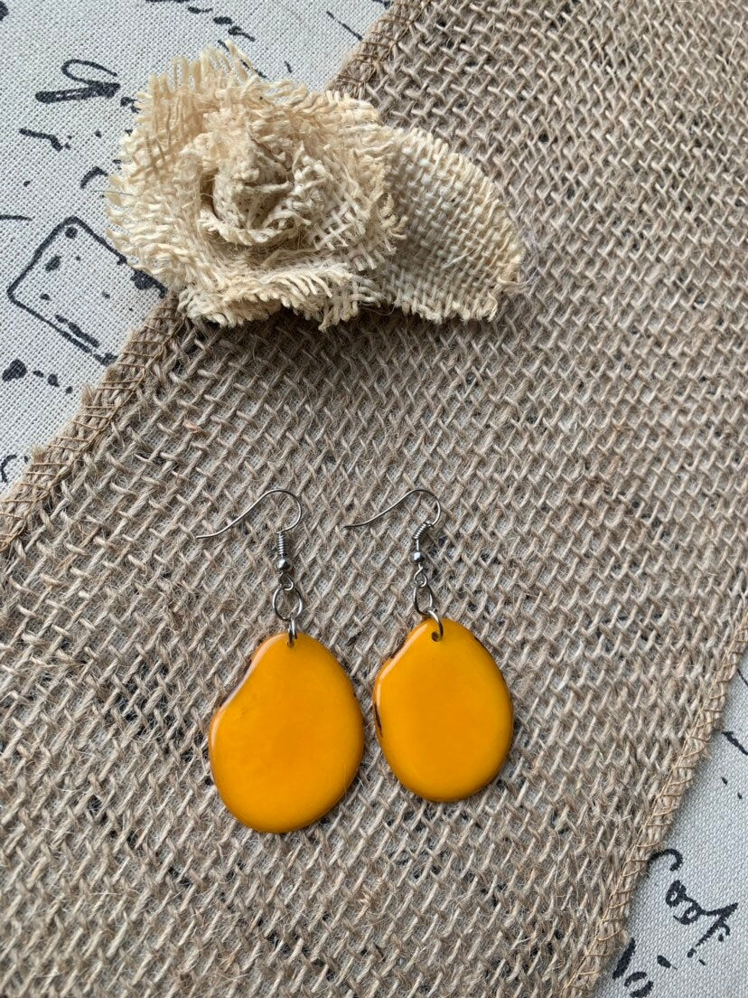 Mustard yellow earrings Tagua jewelry Statement dangle drops Summer fashion trends Artisan handmade in Ecuador Mod unusual trendy For beach
