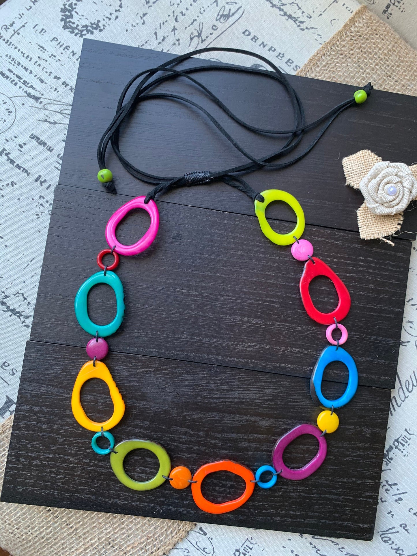 Rainbow statement necklace Tagua necklace Geometric jewelry Donut shape bead Spring fashion Anniversary gift for wife Lightweight adjustable