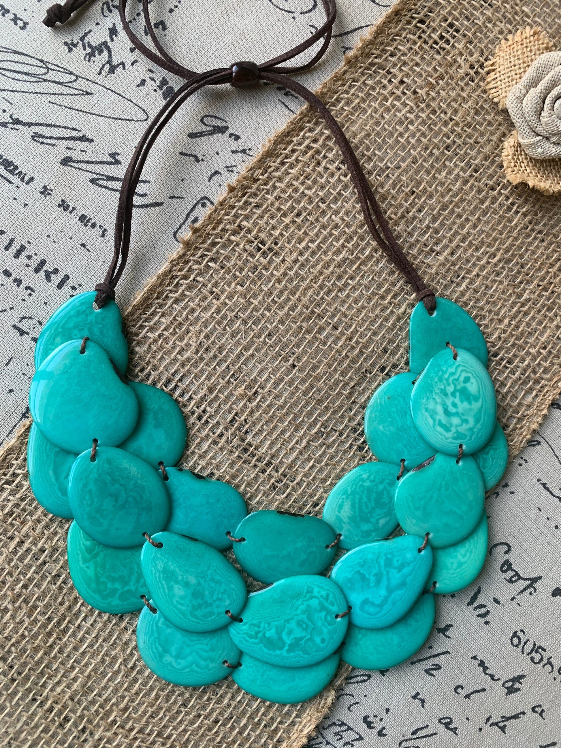 Turquoise green layered statement necklace Tagua jewelry Big bold chunky bib necklace Beaded necklace with leather strap Fall fashion trends