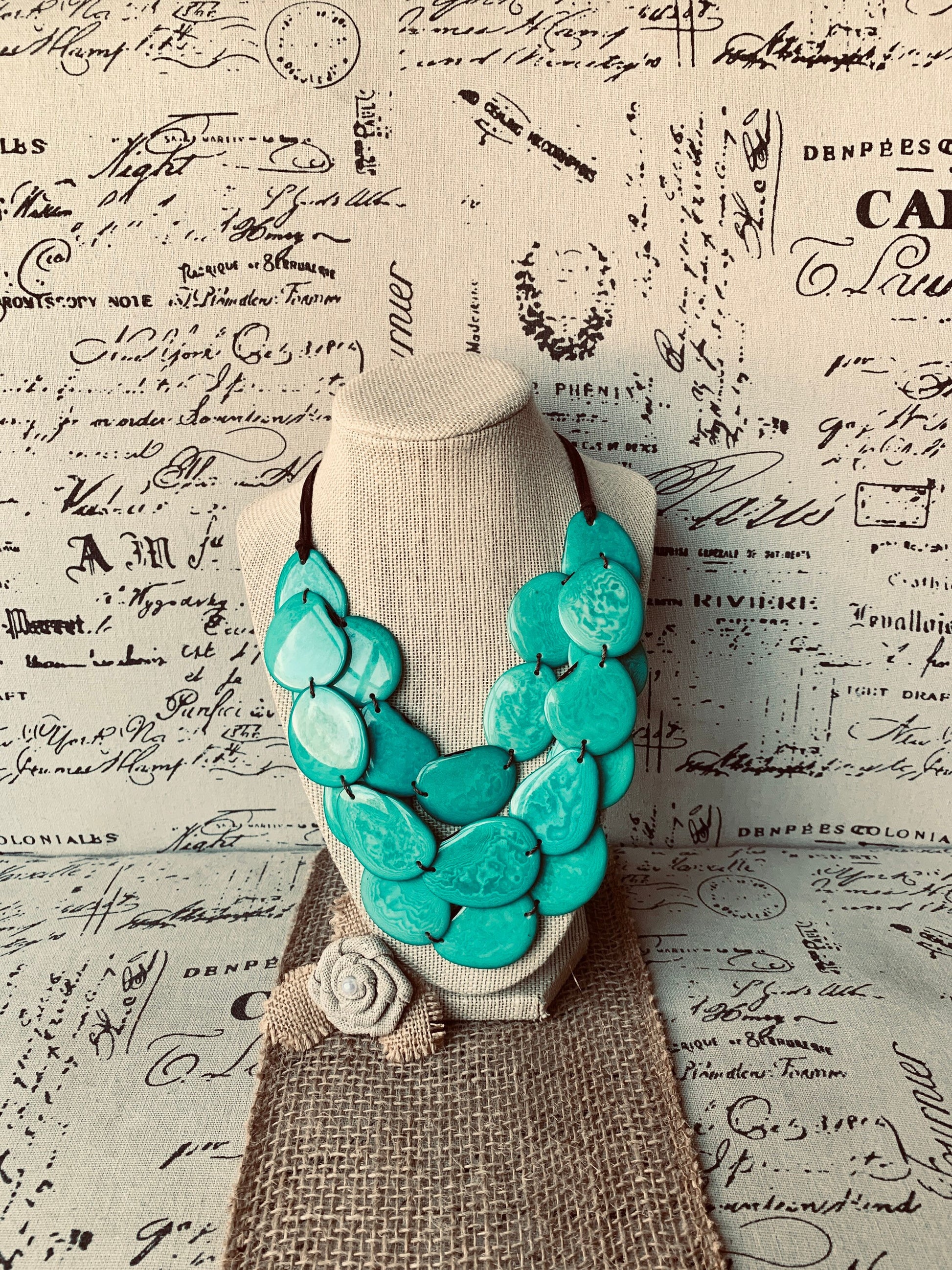 Turquoise green layered statement necklace Tagua jewelry Big bold chunky bib necklace Beaded necklace with leather strap Fall fashion trends