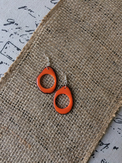 Tagua earrings Fall fashion trends Orange beaded earrings Dangly drop earrings Wearable art Fall fashion 2025s Statement handmade earrings