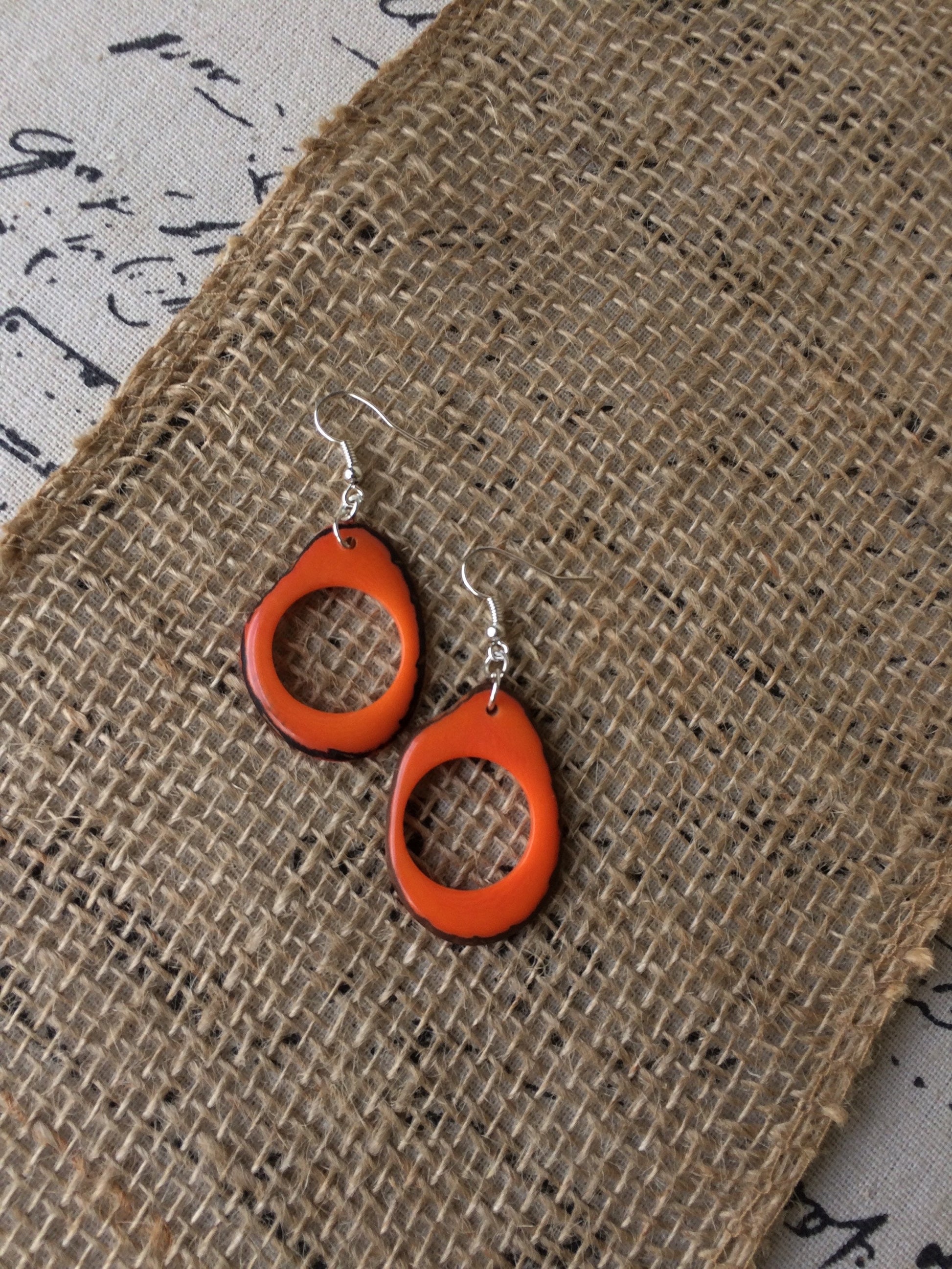 Tagua earrings Fall fashion trends Orange beaded earrings Dangly drop earrings Wearable art Fall fashion 2025s Statement handmade earrings
