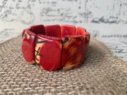 Red beaded bracelet Tagua nut jewelry Spring fashion trends Elastic stretch bracelet Geometric beads bracelet Art to wear Wide cuff bracelet