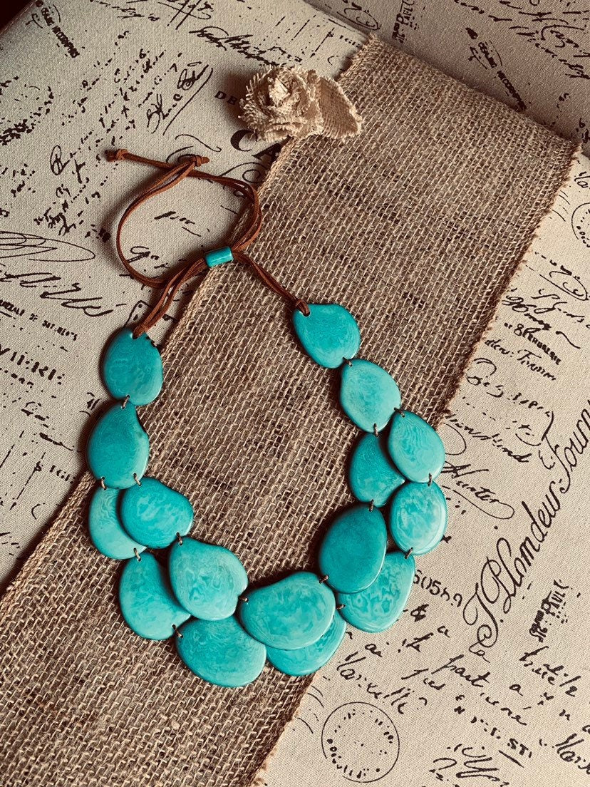 Turquoise green statement necklace made of tagua nut from artisans in Ecuador.
Double layer adjustable necklace. Lightweight jewelry.
For beach cruise.
Gift ideas for mom wife women.