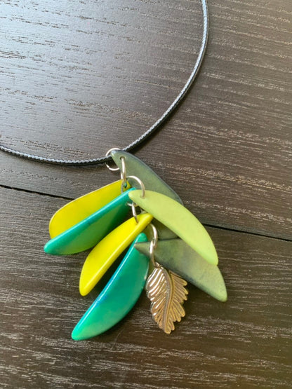 Green leaf necklace Adjustable cord Tagua nut pendant Fall fashion 2025 Wearable art Artisan handmade in Colombia Art to wear Fall fashion