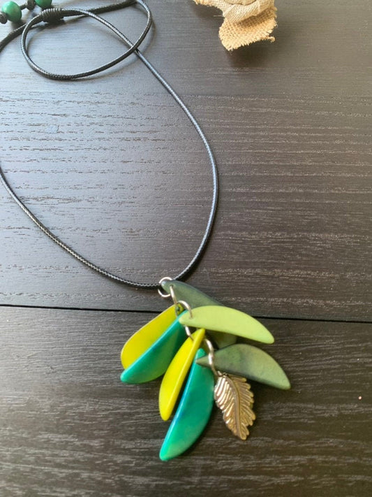 Green leaf necklace Adjustable cord Tagua nut pendant Fall fashion 2025 Wearable art Artisan handmade in Colombia Art to wear Fall fashion