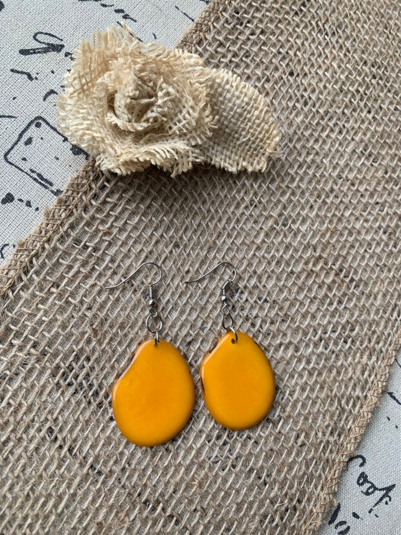 Mustard yellow earrings Tagua jewelry Statement dangle drops Fall fashion trends Artisan handmade in Ecuador Wearable art Beaded earrings