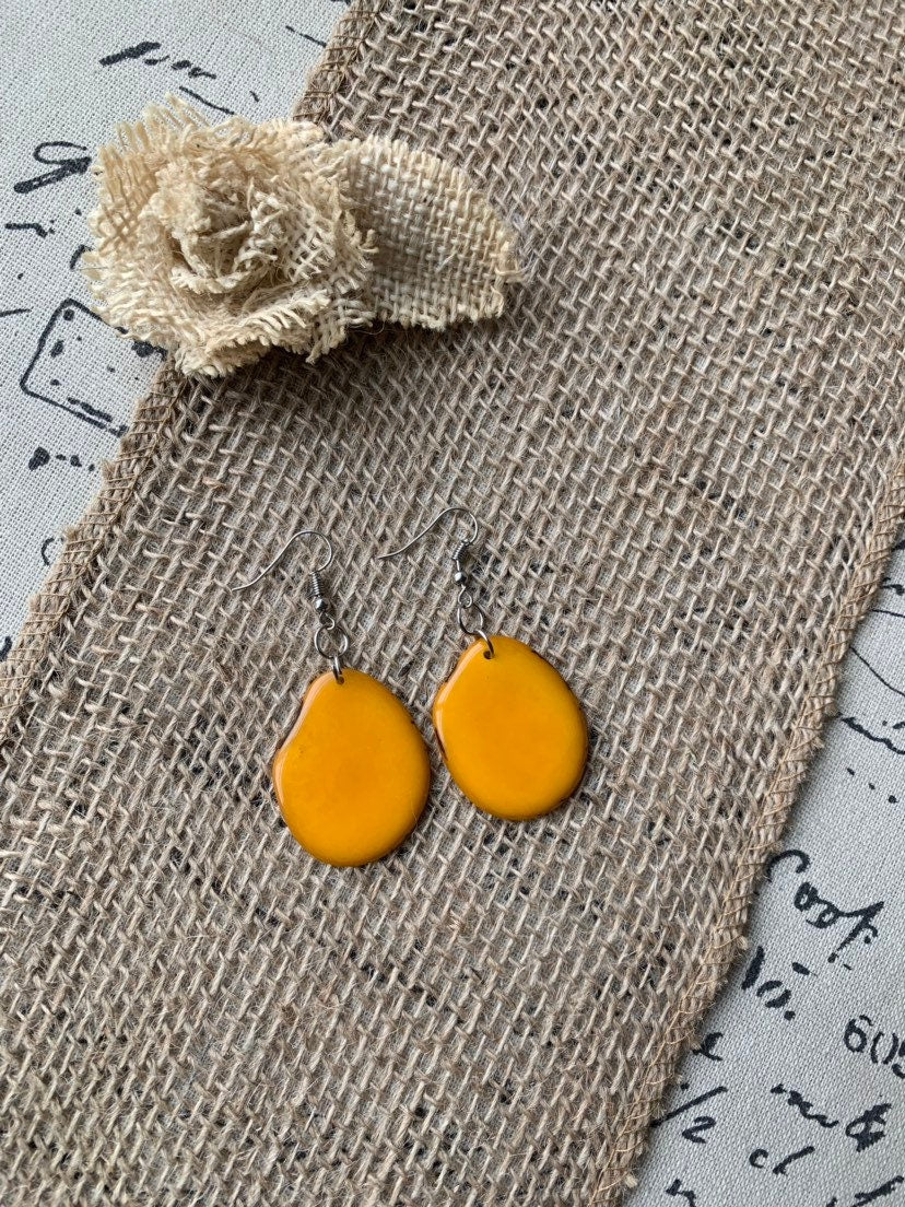 Mustard yellow earrings Tagua jewelry Statement dangle drops Fall fashion trends Artisan handmade in Ecuador Wearable art Beaded earrings