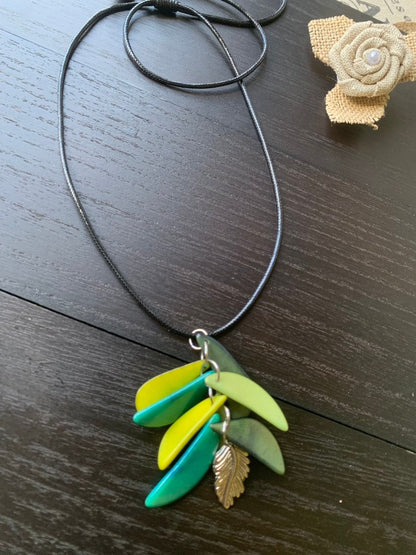 Green leaf necklace Adjustable cord Tagua nut pendant Fall fashion 2025 Wearable art Artisan handmade in Colombia Art to wear Fall fashion