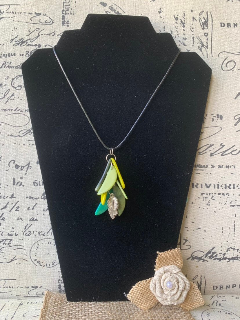 Green leaf necklace Adjustable cord Tagua nut pendant Fall fashion 2025 Wearable art Artisan handmade in Colombia Art to wear Fall fashion