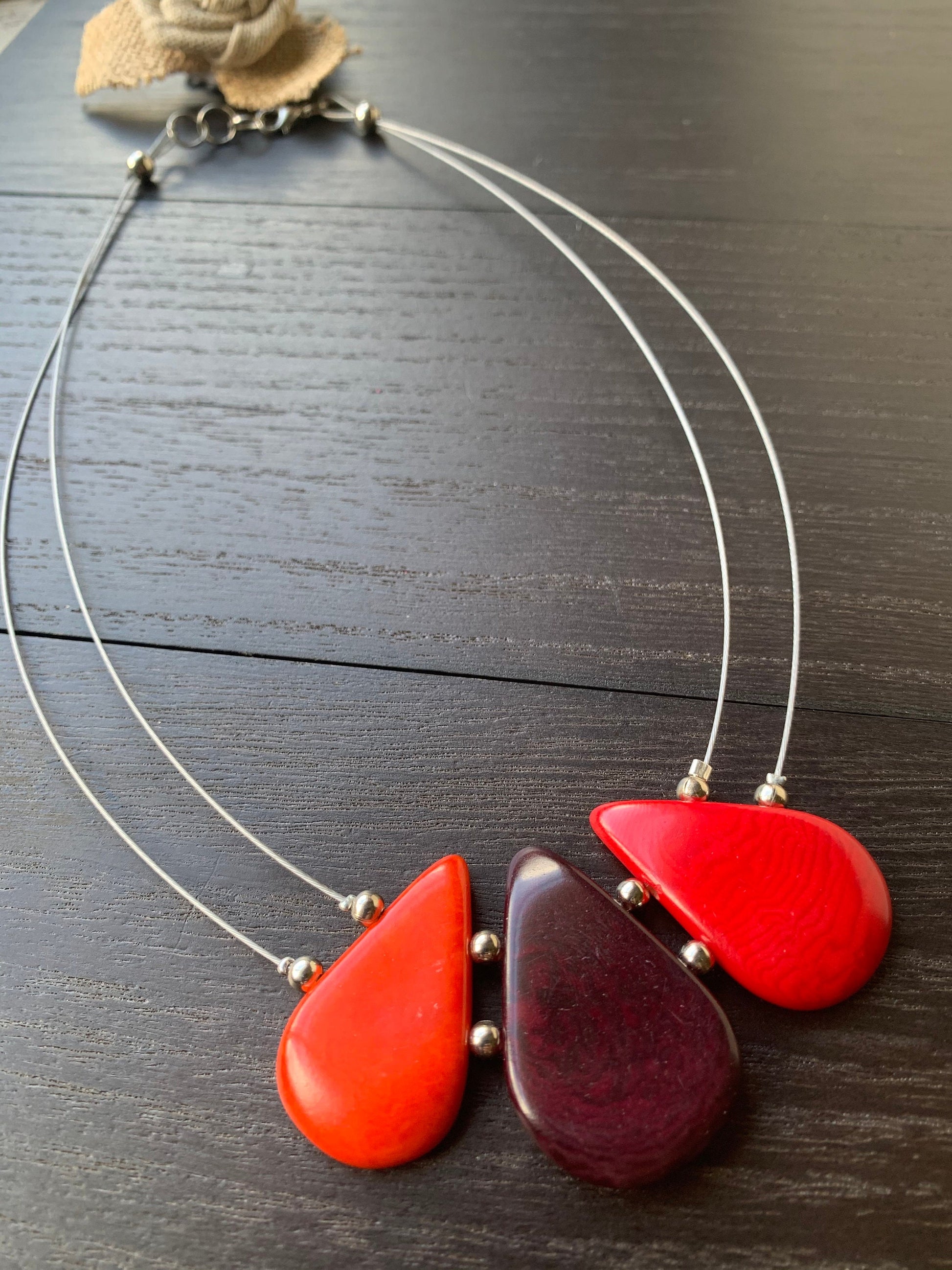 Red and maroon teardrop necklace Tagua jewelry Fall fashion 2025s Beach fashion Wearable art Handmade beaded necklace Statement pendant