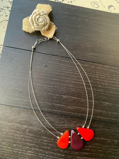 Red and maroon teardrop necklace Tagua jewelry Fall fashion 2025s Beach fashion Wearable art Handmade beaded necklace Statement pendant