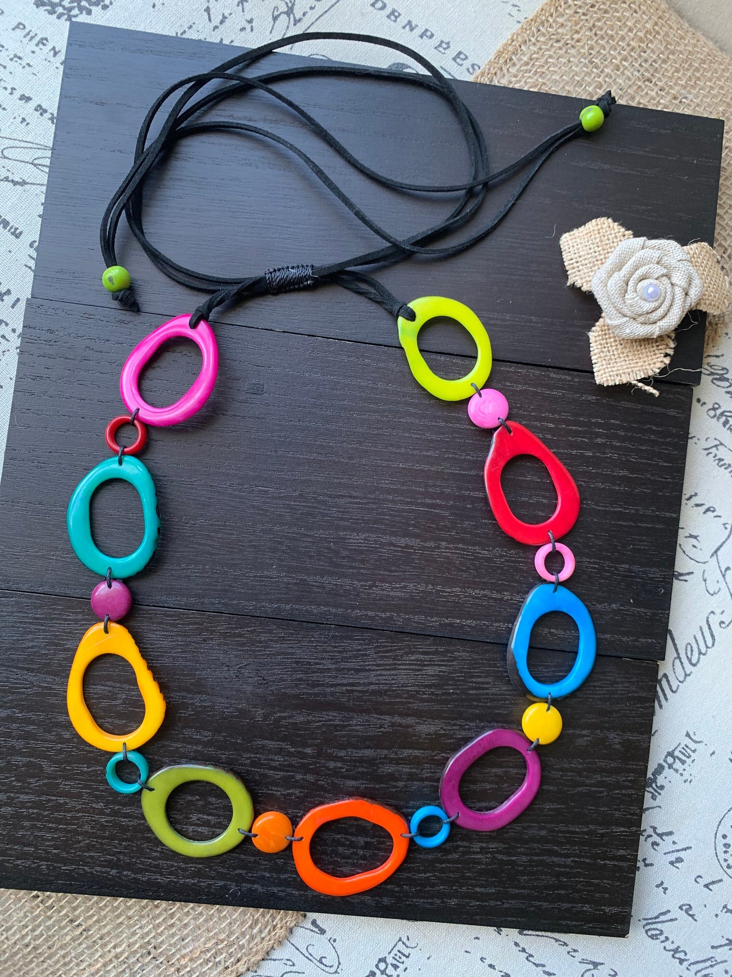 Rainbow statement necklace Tagua jewelry Adjustable cord Fall fashion Wearable art Multi color beaded necklace Pride jewelry Artsy gifts