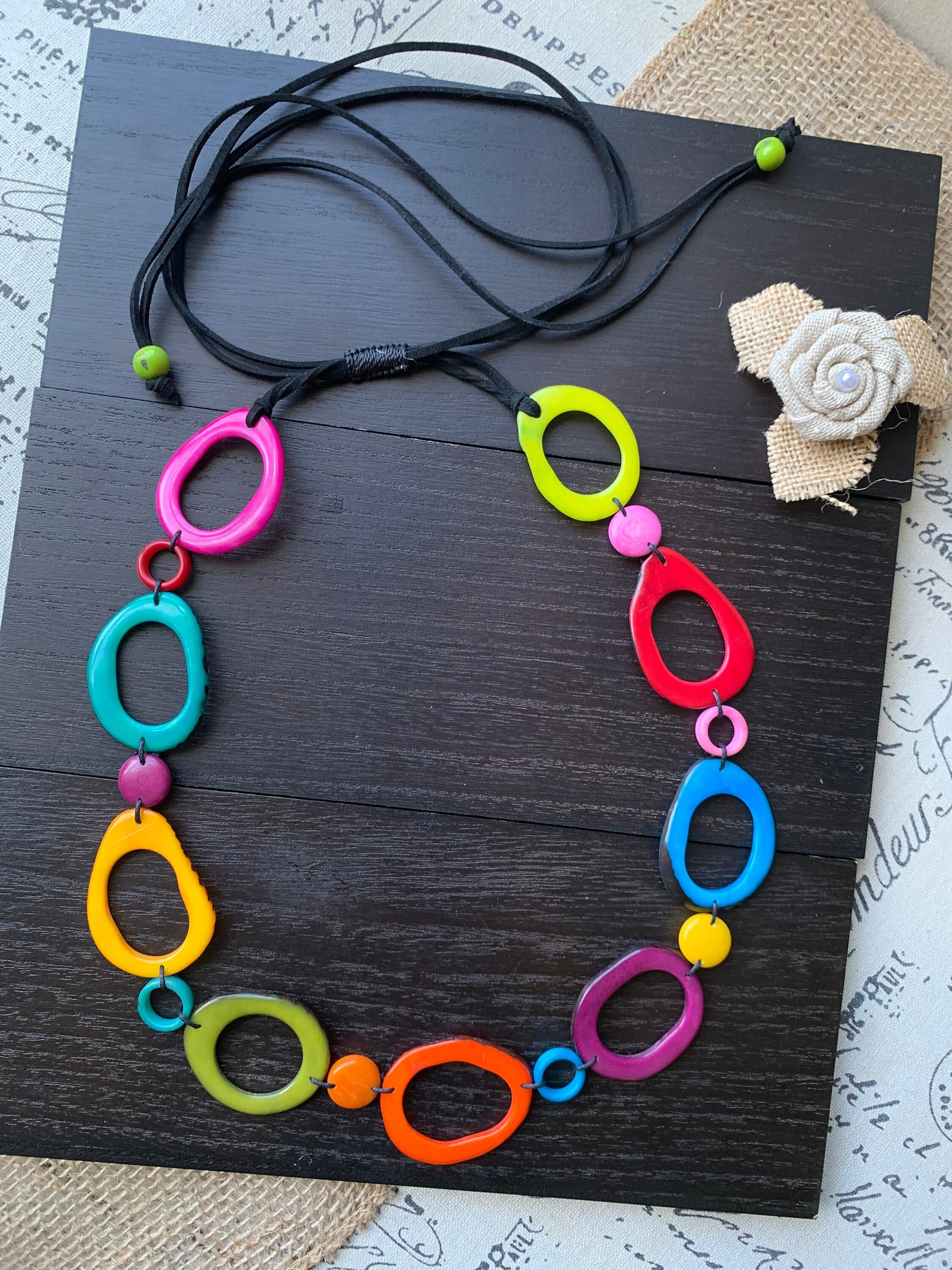Rainbow statement necklace Tagua jewelry Adjustable cord Fall fashion Wearable art Multi color beaded necklace Pride jewelry Artsy gifts
