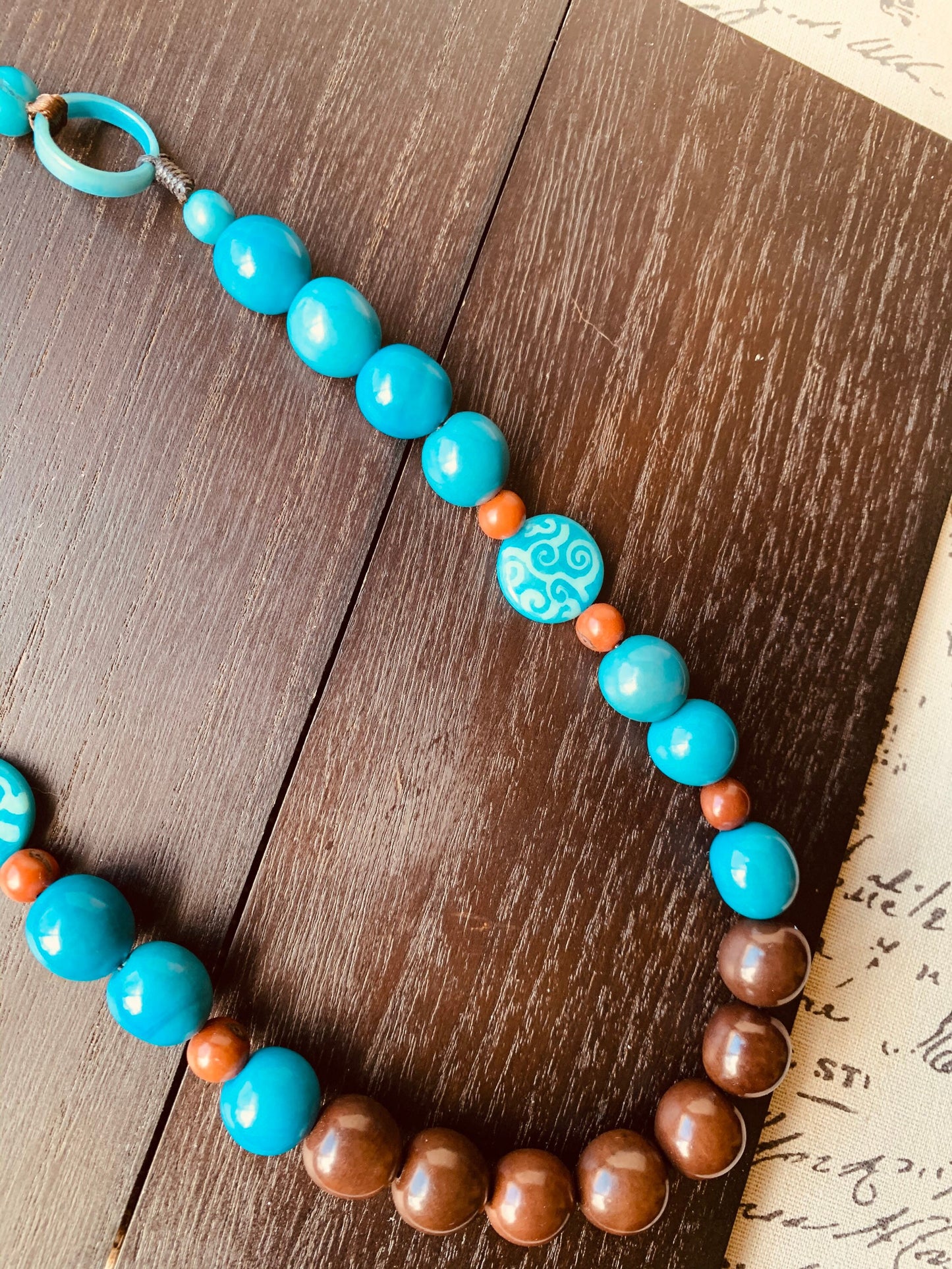 Turquoise and brown statement necklace Tagua necklace Big bold necklaces Fall fashion trends Art to wear Long necklace Fall fashion 2025s