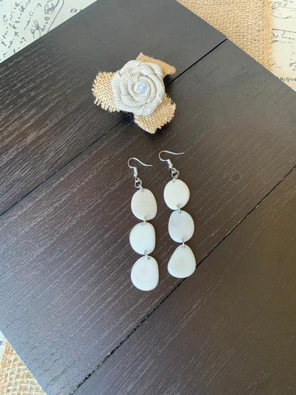 White earrings dangle Extra long tagua earrings Fall fashion 2025s Statement drops Boho mod style Fall fashion 2025 Waterfall earrings