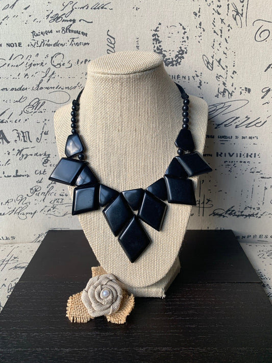 Black necklace.
Tagua necklace.
Statement necklace
Geometric necklace
Black beaded necklace