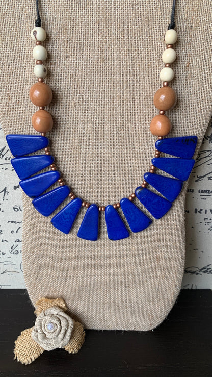 Blue statement necklace Tagua jewelry Handmade beaded necklace Adjustable cord Fall fashion 2025s Wearable art Artistic jewelry Fashionable
