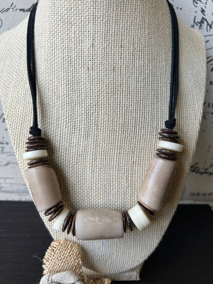 Beige tagua necklace with coconut beads Adjustable cord Fall fashion trends Wearable art Fall fashion 2025s Easter outfit accessories