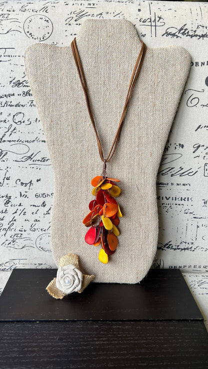 Red orange yellow pendant necklace Boho jewelry Tagua jewelry Adjustable cord Wearable art Fall fashion 2025s Whimsical necklace Lightweight