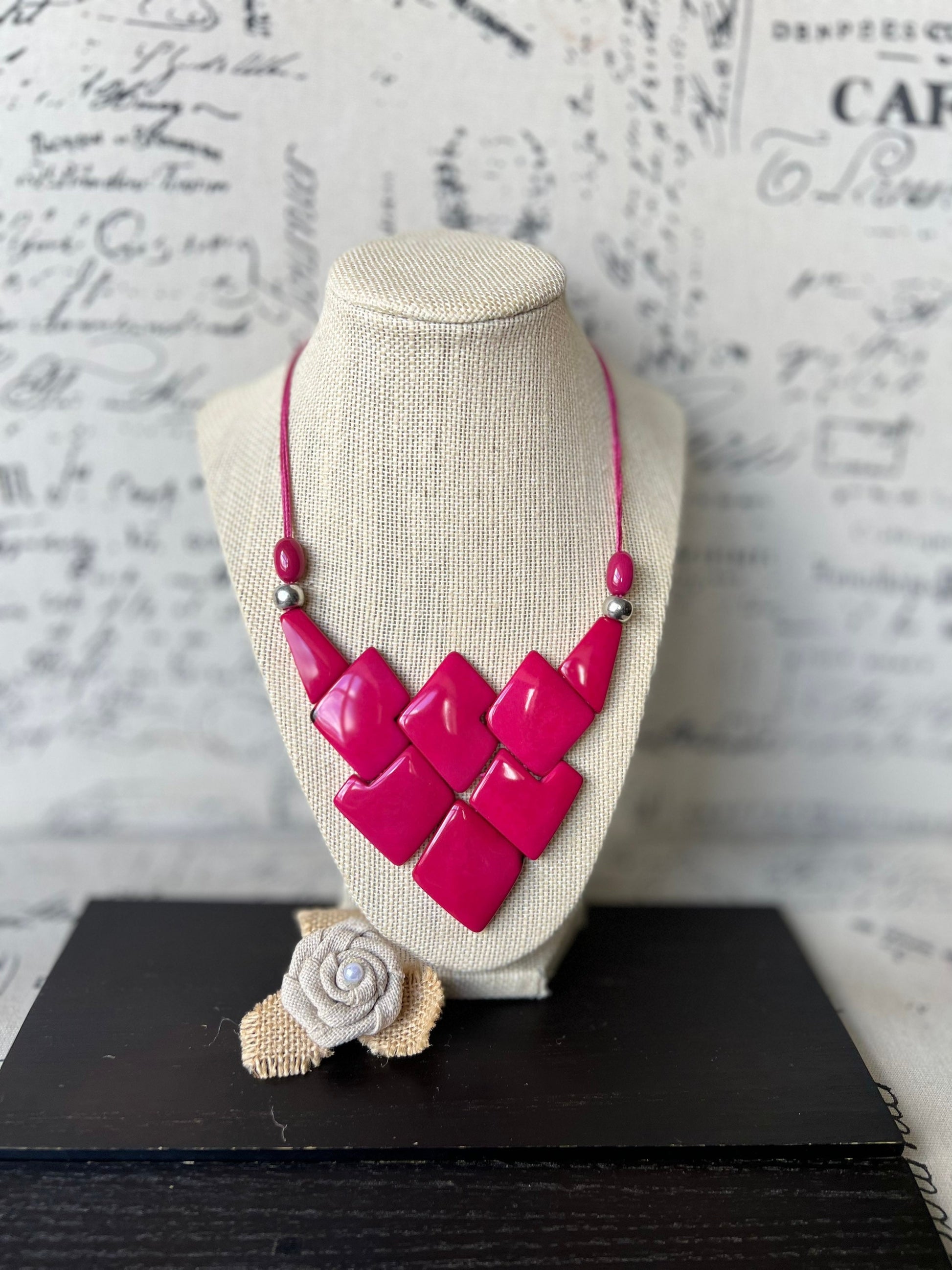 Hot pink statement necklace Tagua jewelry Spring fashion 2025