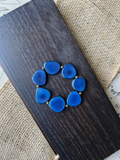 Blue fashion bracelet Tagua jewelry Summer fashion trends Beaded stretch bracelets for women Statement bangle Geometric beads Wearable art