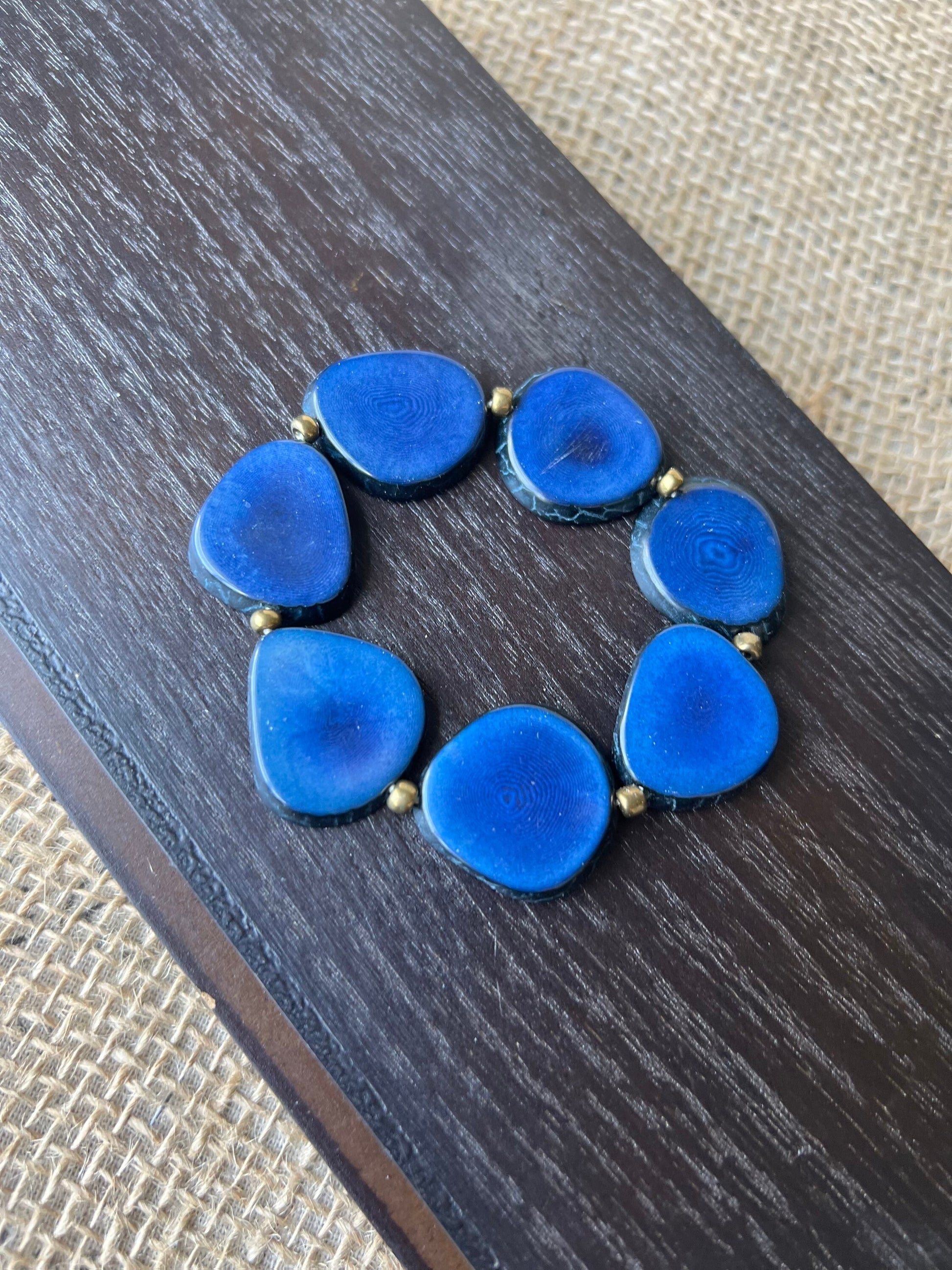Blue fashion bracelet Tagua jewelry Summer fashion trends Beaded stretch bracelets for women Statement bangle Geometric beads Wearable art