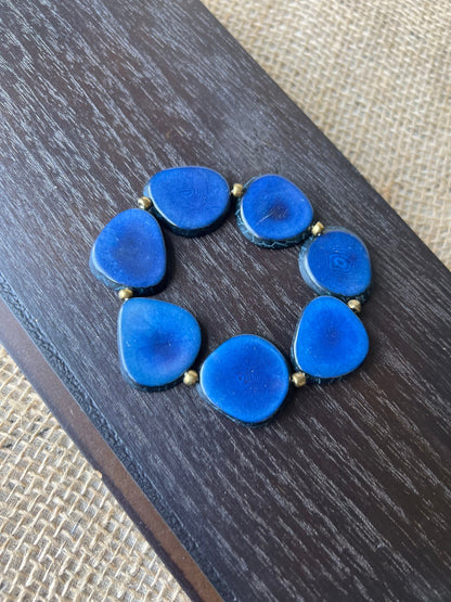Blue fashion bracelet Tagua jewelry Summer fashion trends Beaded stretch bracelets for women Statement bangle Geometric beads Wearable art