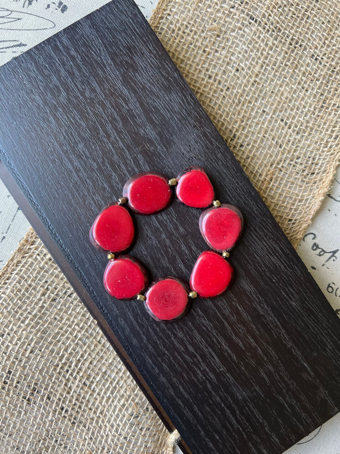 Red fashion bracelet Tagua jewelry Fall fashion trends Beaded stretch bracelets for women Statement bangle Geometric beads Wearable Art