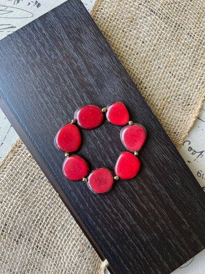 Red fashion bracelet Tagua jewelry Fall fashion trends Beaded stretch bracelets for women Statement bangle Geometric beads Wearable Art