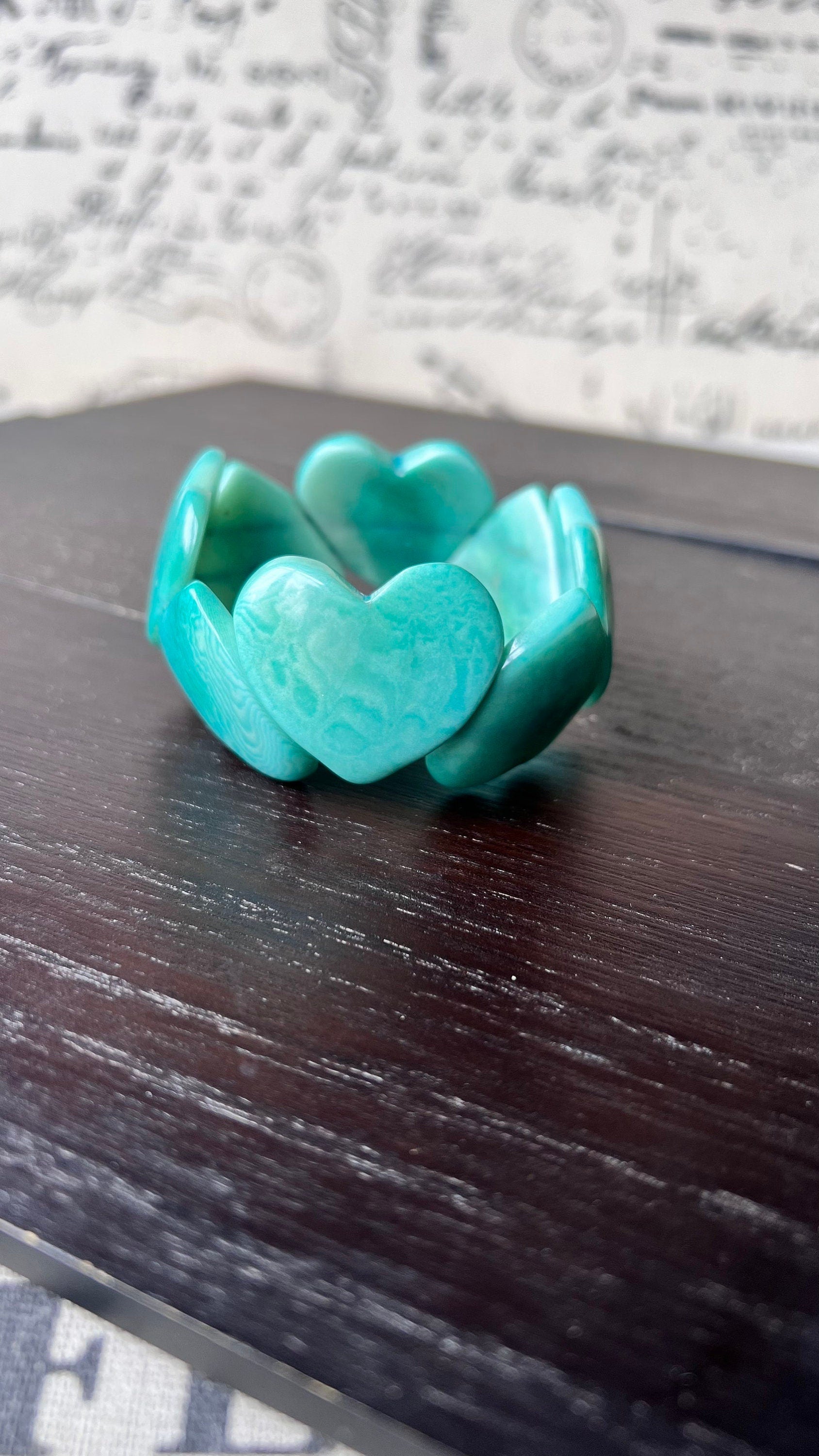 Turquoise green heart shaped bracelet Tagua jewelry Statement beaded bangle Fall fashion 2025 Wearable art Handmade beaded elastic bangle