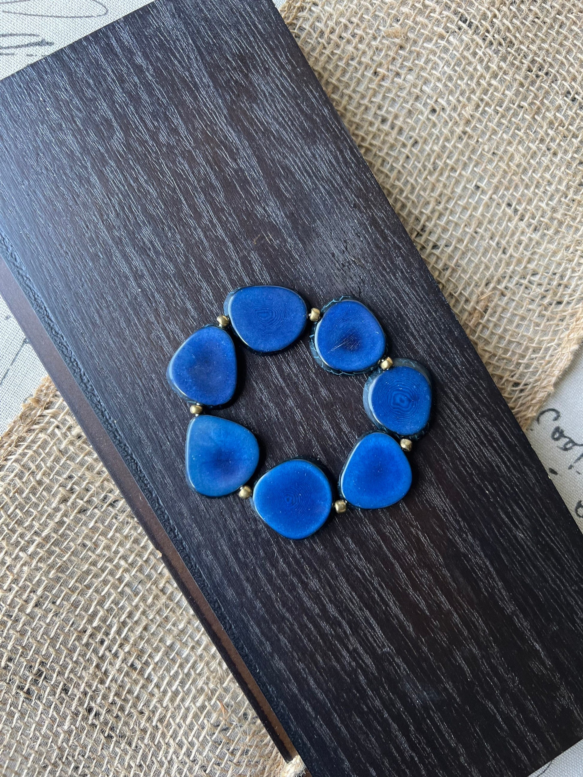 Blue fashion bracelet Tagua jewelry Summer fashion trends Beaded stretch bracelets for women Statement bangle Geometric beads Wearable art