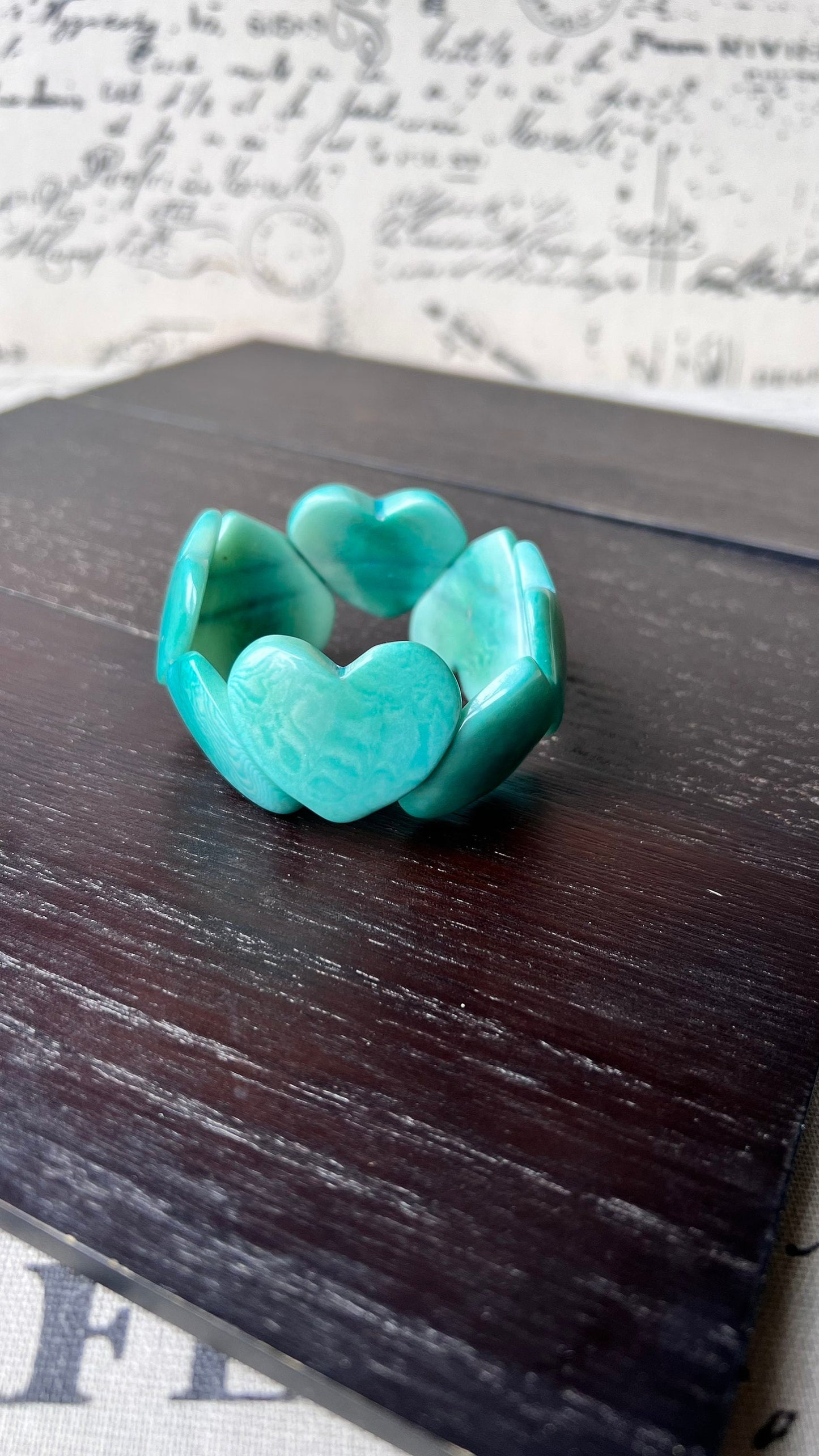 Turquoise green heart shaped bracelet Tagua jewelry Statement beaded bangle Fall fashion 2025 Wearable art Handmade beaded elastic bangle