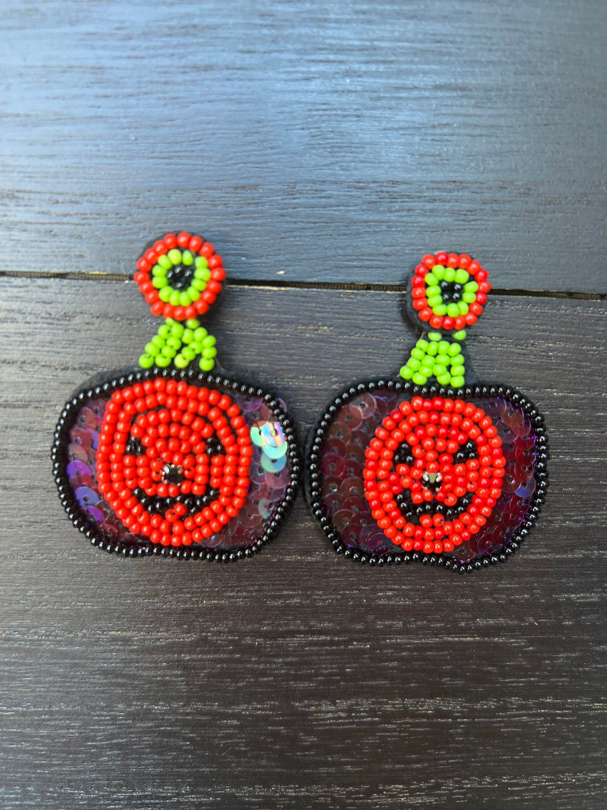 Halloween jewelry for women Pumpkin dangle earrings Seed bead drop earrings Fall fashion trend Orange statement earrings Autumn party gifts
