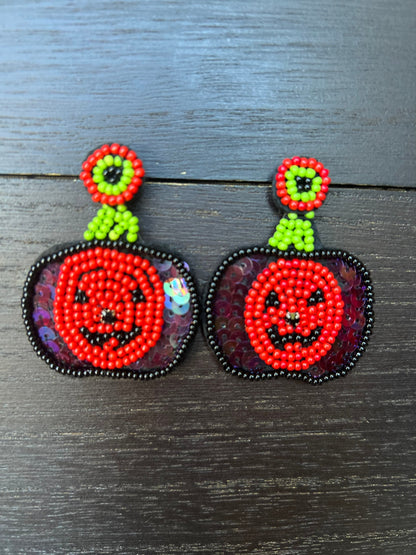 Halloween jewelry for women Pumpkin dangle earrings Seed bead drop earrings Fall fashion trend Orange statement earrings Autumn party gifts