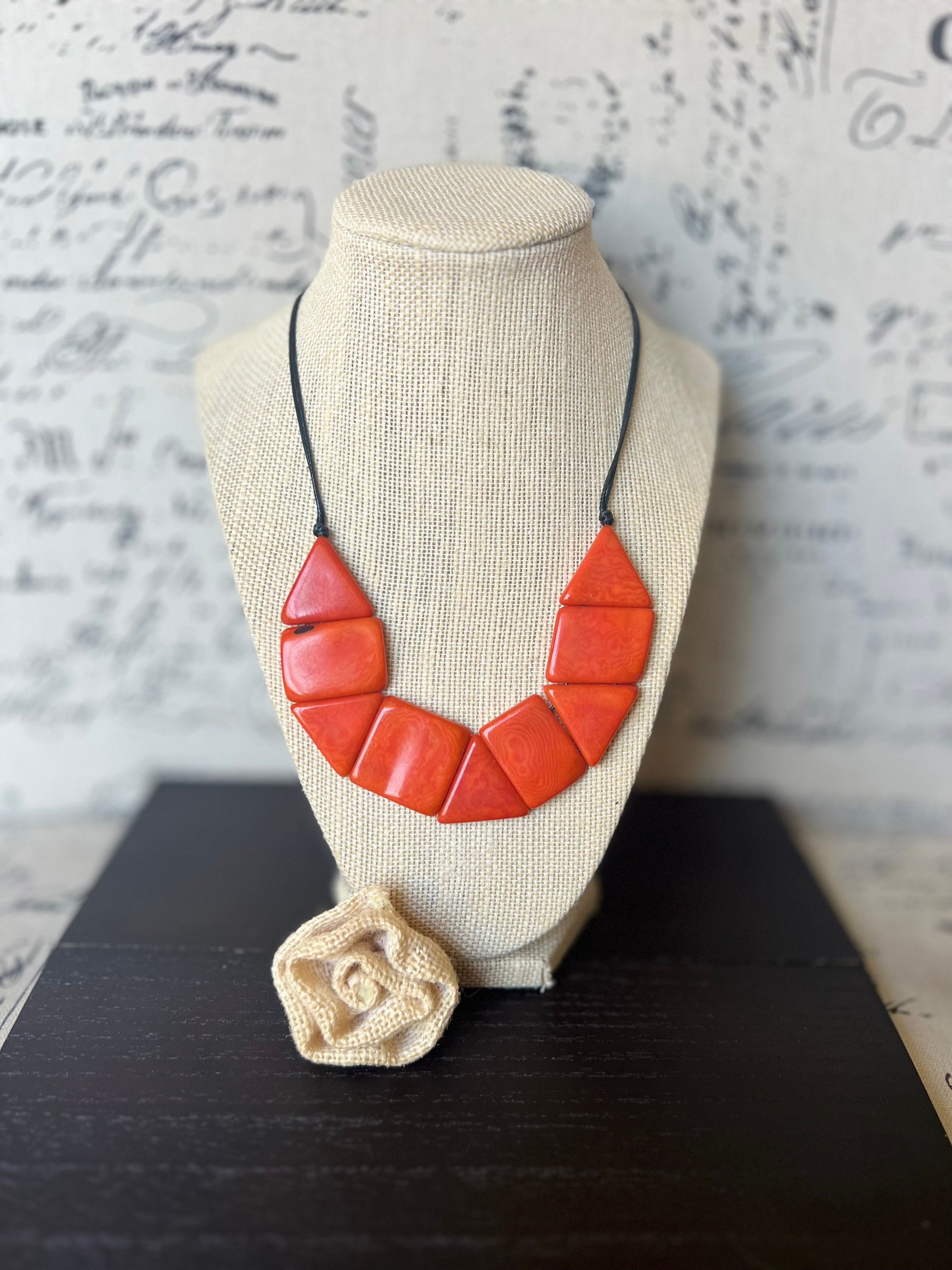 Orange beaded necklace Tagua jewelry Adjustable cord Lightweight Fall fashion trends Fall fashion 2025 Wearable art Simple necklace