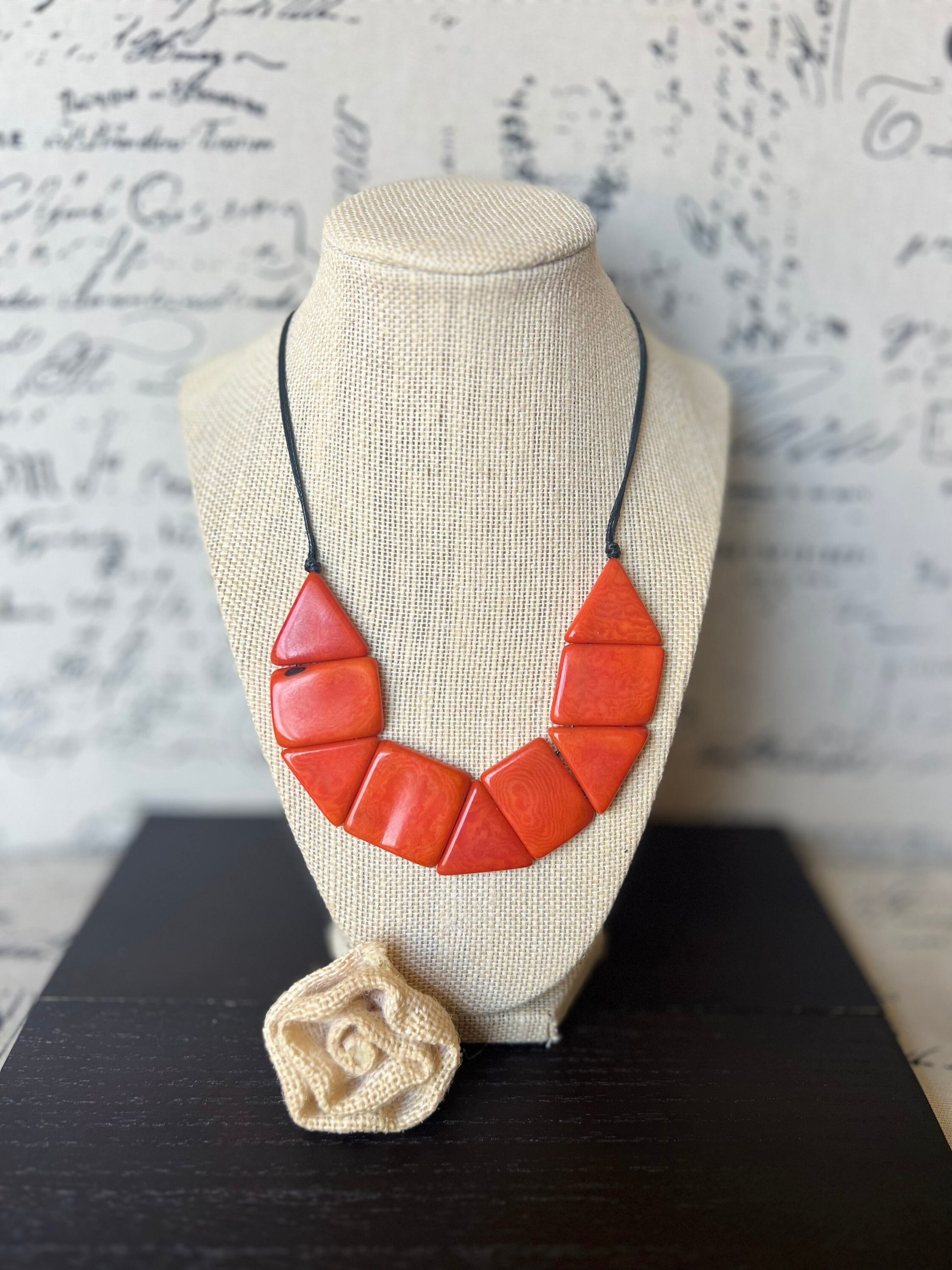 Orange beaded necklace Tagua jewelry Adjustable cord Lightweight Fall fashion trends Fall fashion 2025 Wearable art Simple necklace