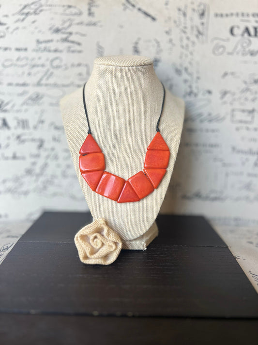 Orange beaded necklace Tagua jewelry Adjustable cord Lightweight Fall fashion trends Fall fashion 2025 Wearable art Simple necklace