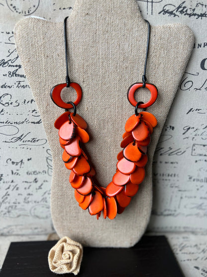 Orange statement necklace Tagua jewelry Beaded necklaces handmade Adjustable cord Unique gift for women Artisan jewelry findings Art to wear