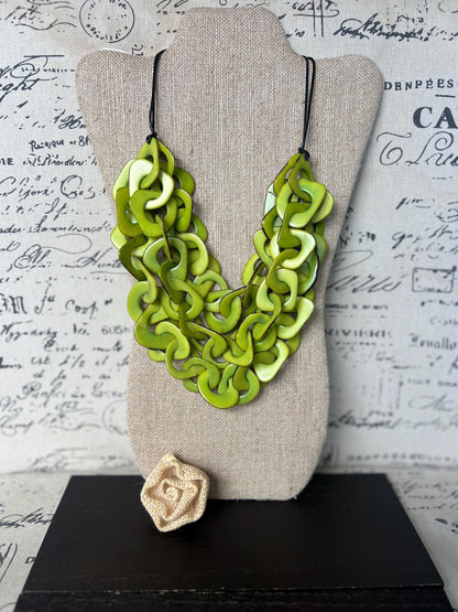 Lime green statement necklace made of tagua nut from artisans in Ecuador.
Interlocking chain adjustable necklace. Lightweight jewelry.
For beach cruise.
Gift ideas for mom wife women.