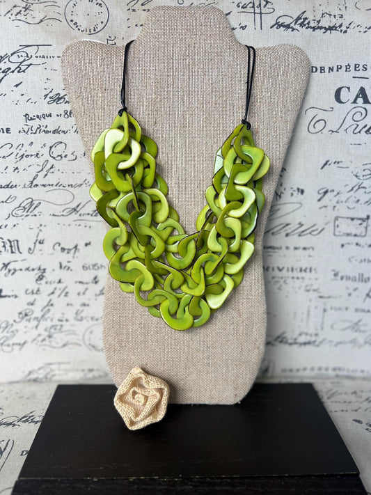 Lime green statement necklace made of tagua nut from artisans in Ecuador.
Interlocking chain adjustable necklace. Lightweight jewelry.
For beach cruise.
Gift ideas for mom wife women.